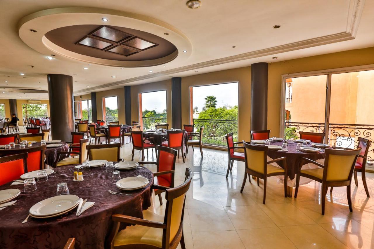 Hotel Al Bassatine Бени Мелал Екстериор снимка